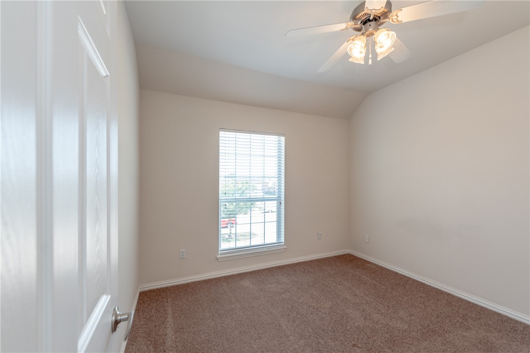 1001 Krenek Tap Road, Unit 1102 College Station, TX 77840 - Photo 12 of 26 an empty room with a window