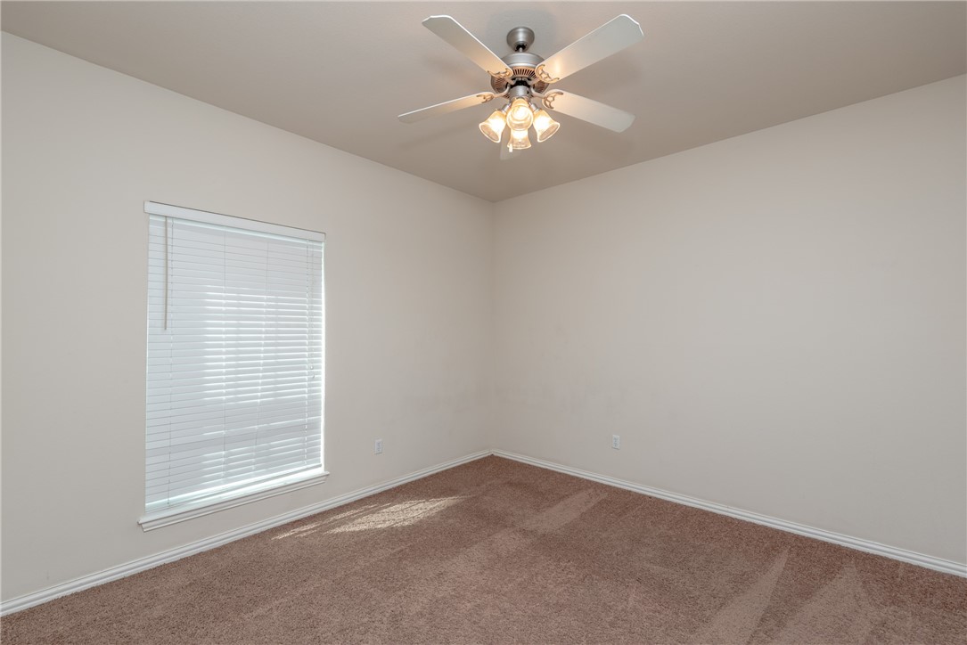 1001 Krenek Tap Road, Unit 1102 College Station, TX 77840 - Photo 15 of 26 an empty room with a window