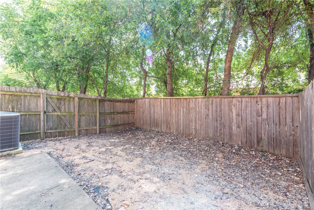 1001 Krenek Tap Road, Unit 1102 College Station, TX 77840 - Photo 25 of 26 a backyard of a house