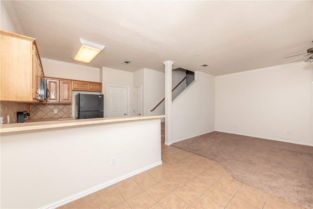1001 Krenek Tap Road, Unit 1102 College Station, TX 77840 - Photo 5 of 26 a view of a kitchen with furniture and a kitchen