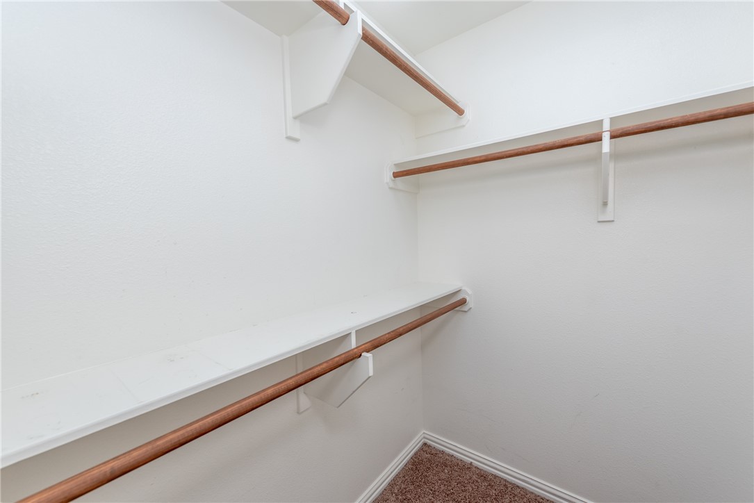 1001 Krenek Tap Road, Unit 1102 College Station, TX 77840 - Photo 10 of 26 a view of a room with racks on the wall