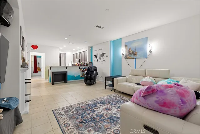 a living room with furniture and a couch