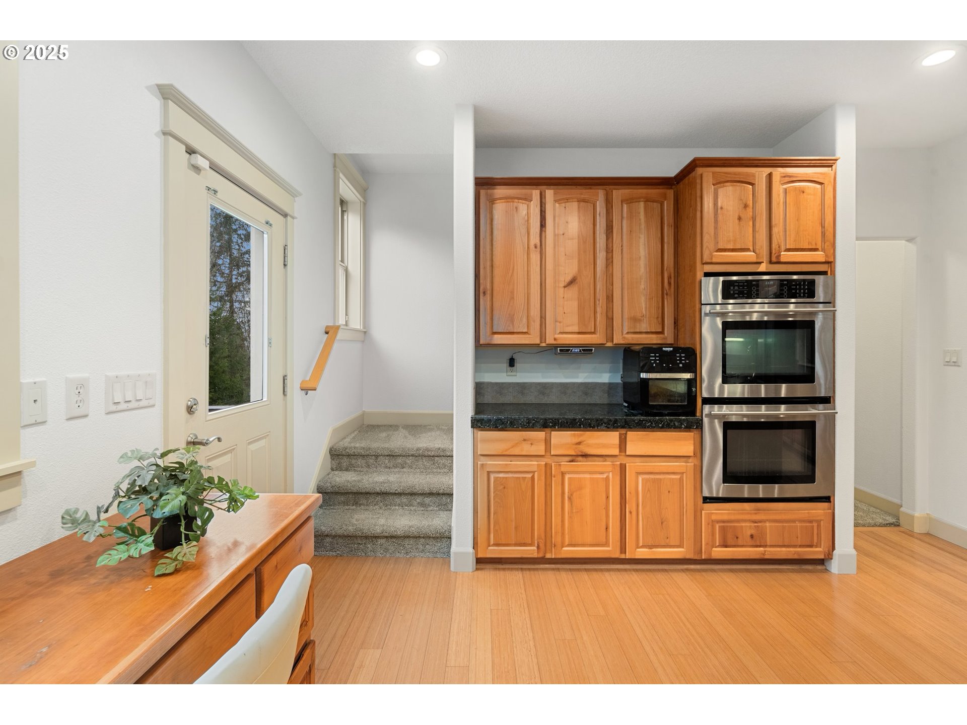 30180 Carrico Valley Road St. Helens, OR 97051 - Photo 16 of 48 a kitchen with granite countertop a stove and a refrigerator