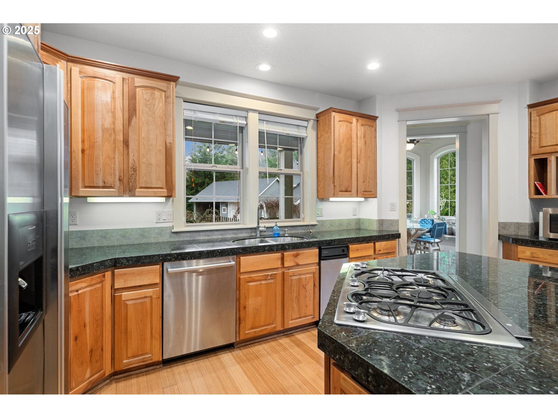 30180 Carrico Valley Road St. Helens, OR 97051 - Photo 19 of 48 a kitchen with granite countertop a stove and a sink