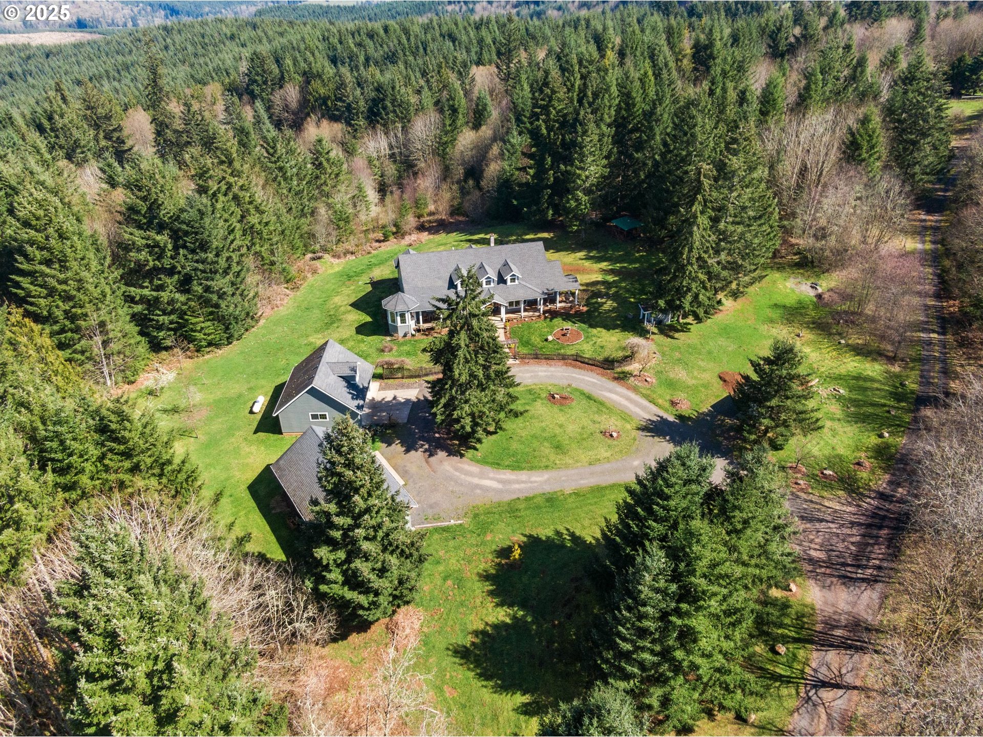 30180 Carrico Valley Road St. Helens, OR 97051 - Photo 2 of 48 an aerial view of residential house with outdoor space and trees all around