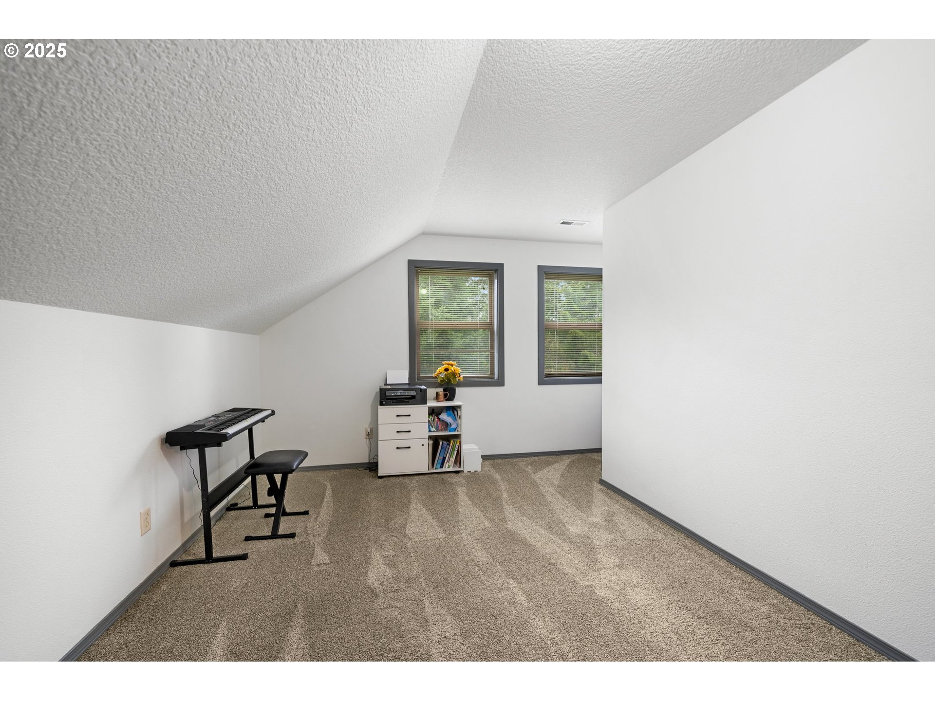30180 Carrico Valley Road St. Helens, OR 97051 - Photo 31 of 48 a view of an empty room with window and a fireplace