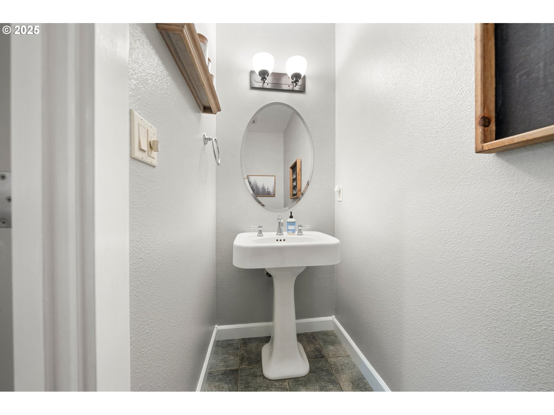 30180 Carrico Valley Road St. Helens, OR 97051 - Photo 33 of 48 a view of a bathroom with a sink and a mirror