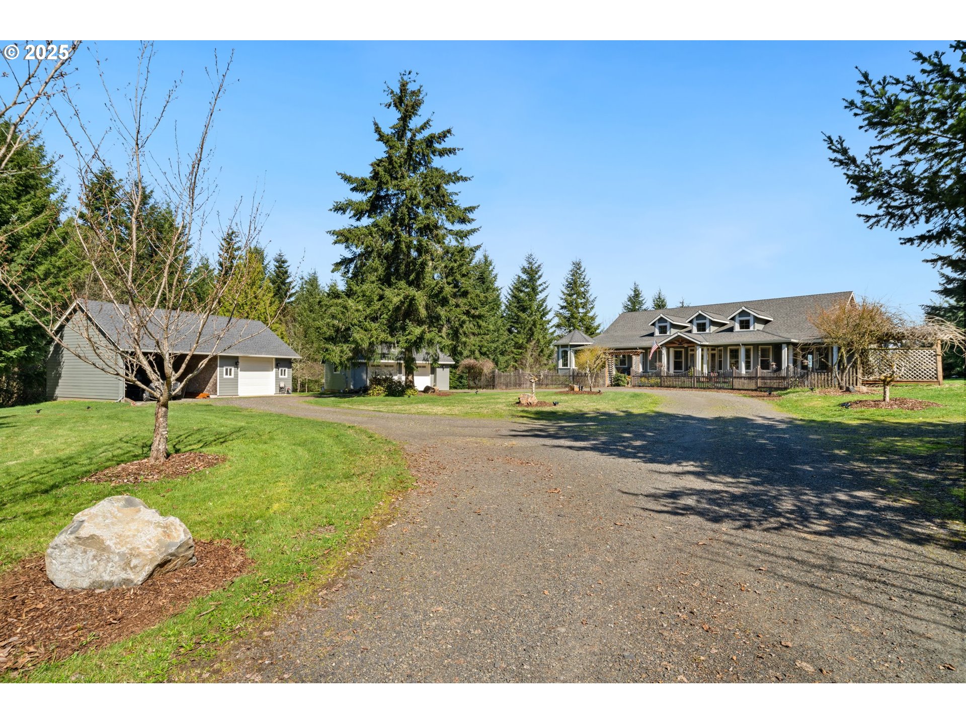30180 Carrico Valley Road St. Helens, OR 97051 - Photo 4 of 48 a swimming pool with outdoor seating and yard