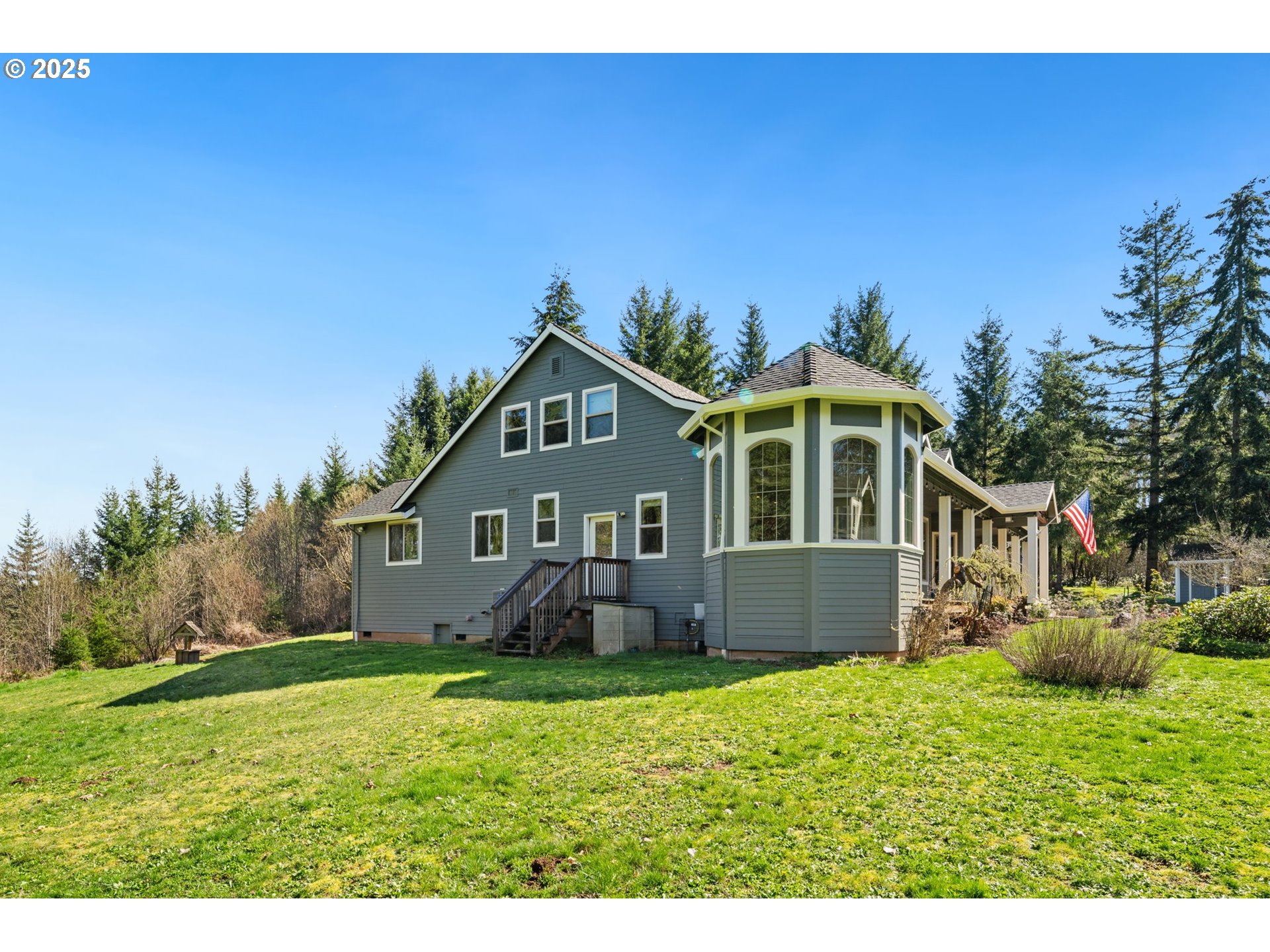 30180 Carrico Valley Road St. Helens, OR 97051 - Photo 47 of 48 a front view of a house with a garden