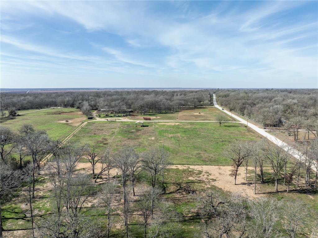 2 River Ridge Drive Hearne, TX 77859 - Photo 1 of 18 a view of a water with large trees