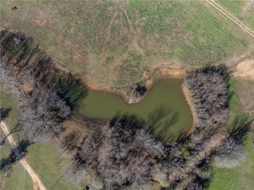 2 River Ridge Drive Hearne, TX 77859 - Photo 11 of 18 a aerial view of a house with a yard
