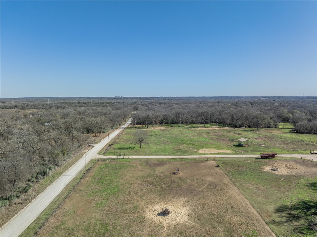 2 River Ridge Drive Hearne, TX 77859 - Photo 5 of 18 a view of a swimming pool and a yard