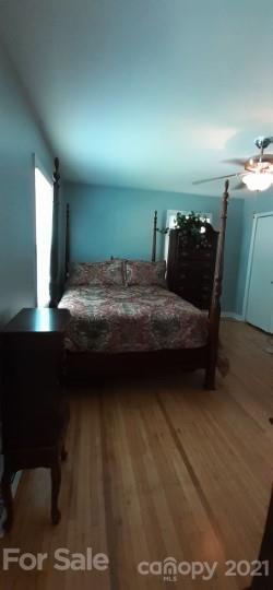 5111 Lodestone Road Charlotte, NC 28215 - Photo 11 of 19 a bedroom with a bed and teddy bear on bed