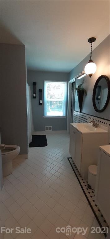5111 Lodestone Road Charlotte, NC 28215 - Photo 14 of 19 a view of utility room