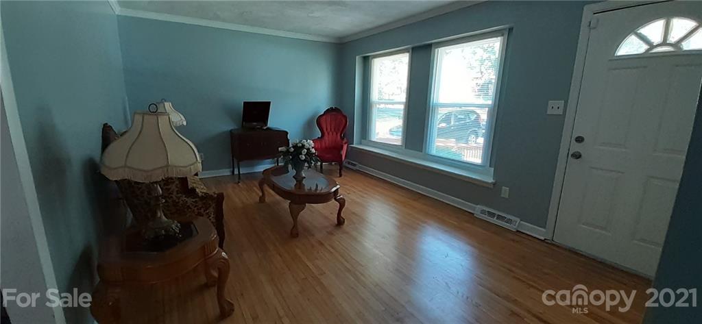 5111 Lodestone Road Charlotte, NC 28215 - Photo 7 of 19 a view of a workspace with furniture and a window