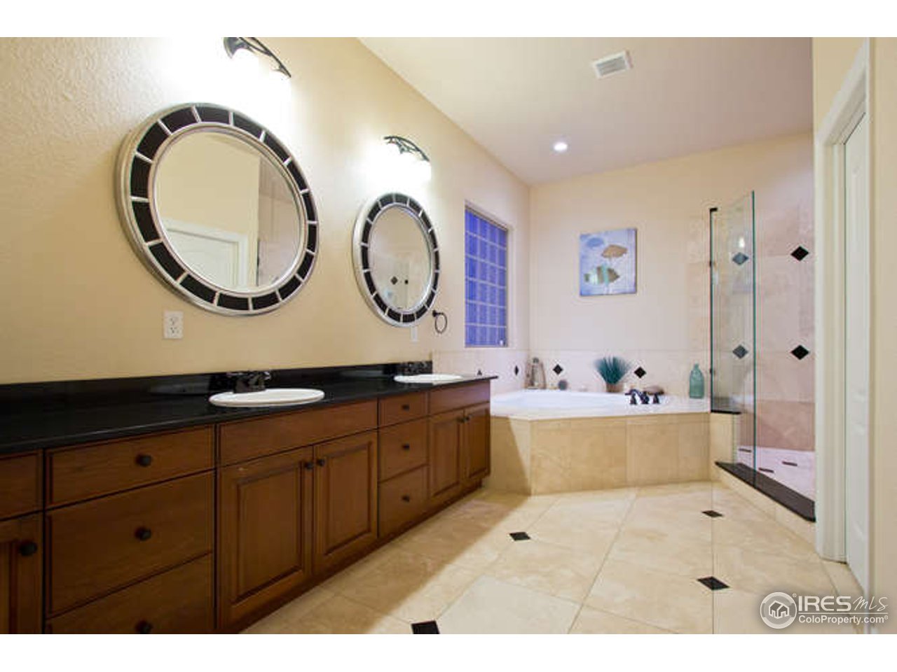 7737 Poudre River Road Greeley, CO 80634 - Photo 12 of 20 5-piece master bath with over-sized shower and tub