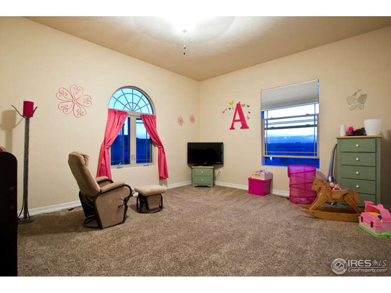 7737 Poudre River Road Greeley, CO 80634 - Photo 13 of 20 Large bedrooms with views to the west