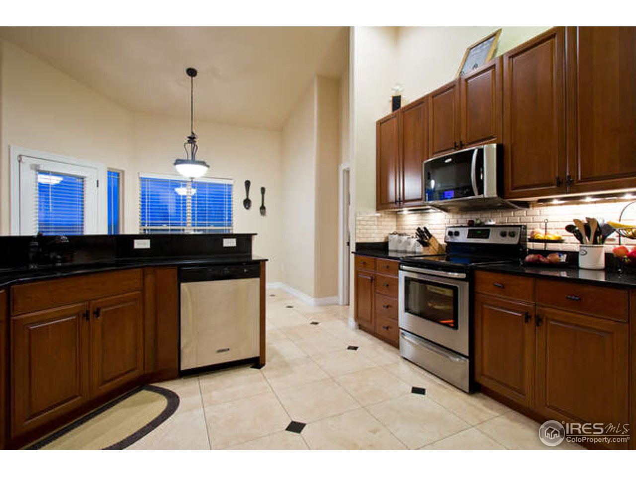 7737 Poudre River Road Greeley, CO 80634 - Photo 8 of 20 All stainless appliances included