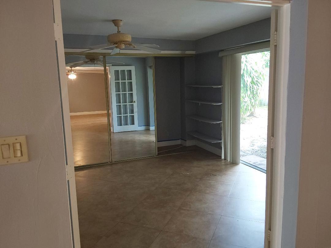 98 Seminole Lane Boca Raton, FL 33487 - Photo 41 of 42 an empty room with windows