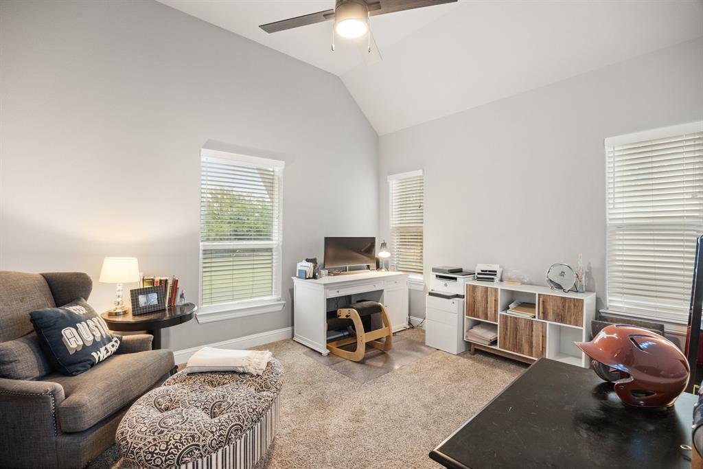 1800 Knox Road Tolar, TX 76476 - Photo 23 of 38 Bedroom#4 is set up as a spacious office but has full closet vaulted ceilin with multiple windows, recessed lighting, and a ceiling fan. Shares a Jack & Jill bathroom with bedroom #3
