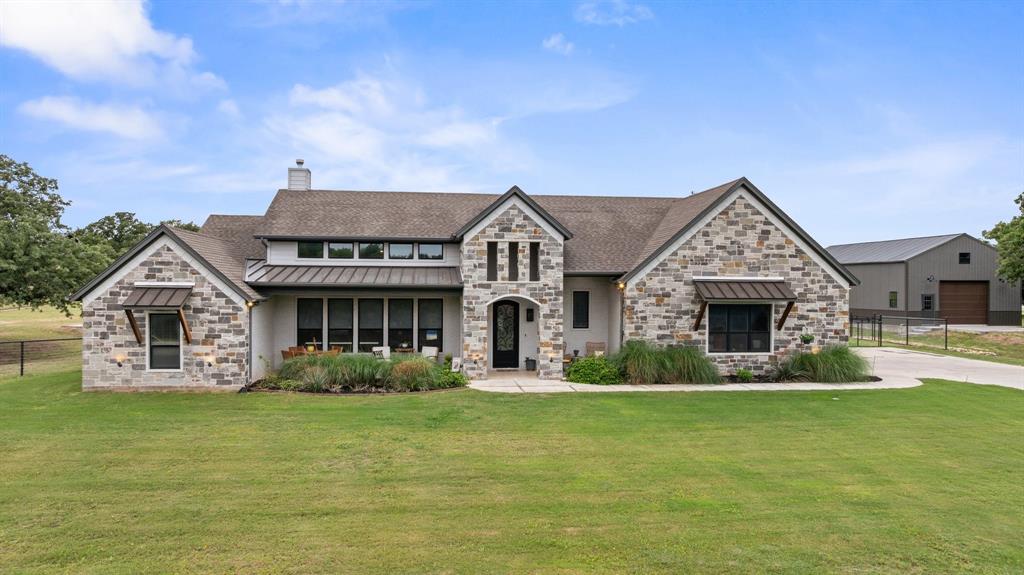 1800 Knox Road Tolar, TX 76476 - Photo 4 of 38 Stone and brick exterior with multiple gables