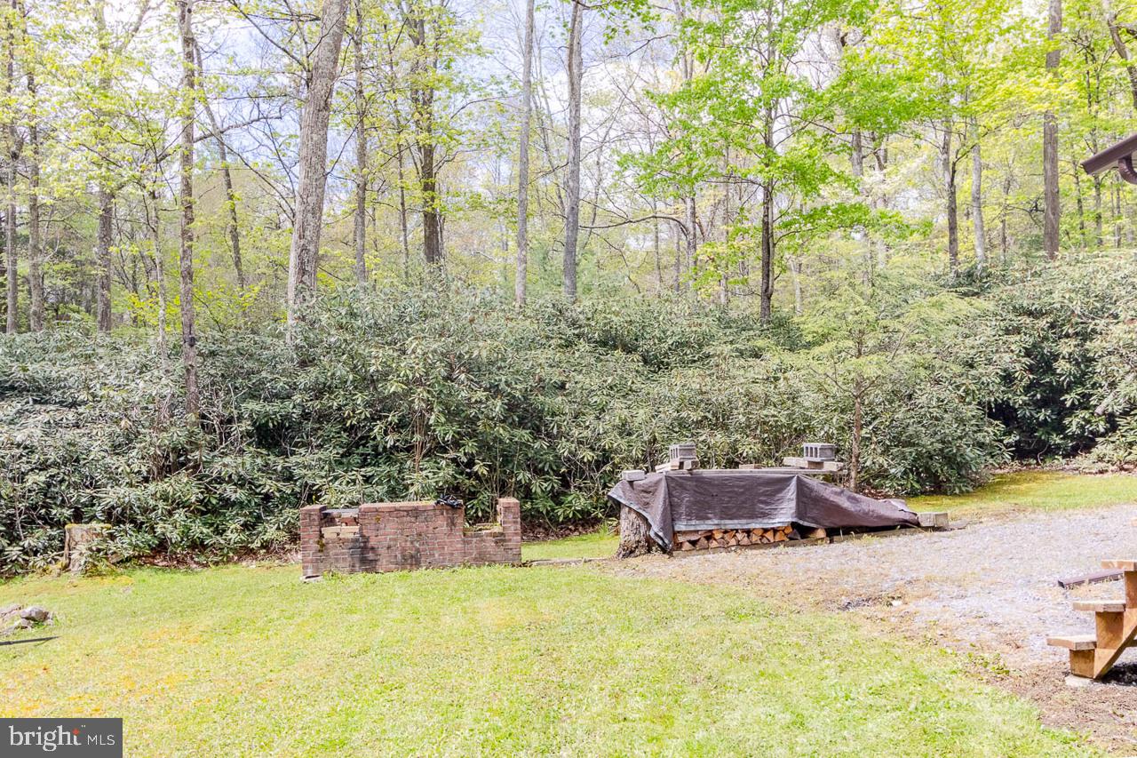556 Treaster Kettle Road Centre Hall, PA 16828 - Photo 15 of 32 a swimming pool with trees in the background