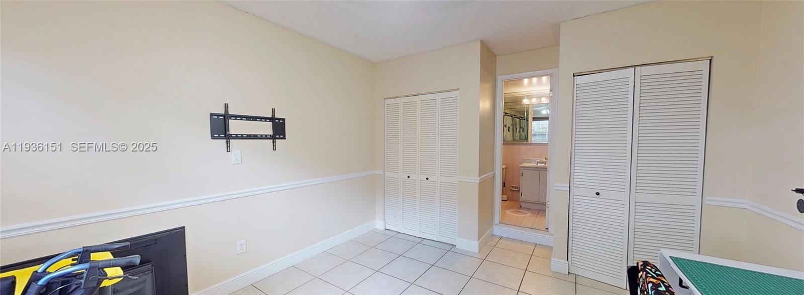 4235 Southwest 148th Place Miami, FL 33185 - Photo 6 of 23 a view of an entryway with wooden floor