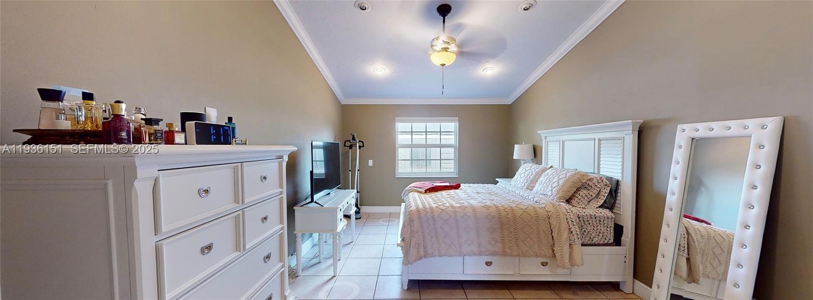 4235 Southwest 148th Place Miami, FL 33185 - Photo 8 of 23 a bedroom with a bed and a dresser