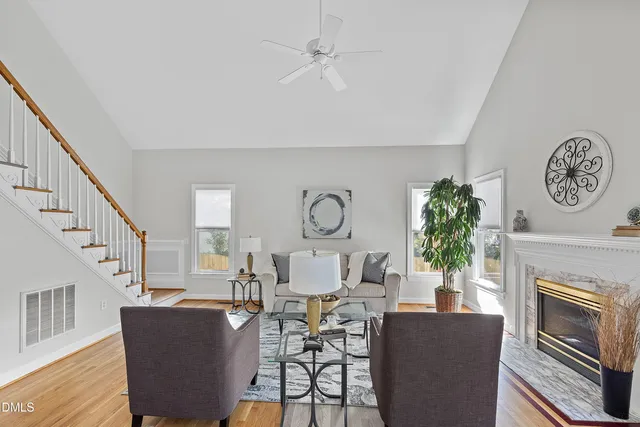 a bathroom with a sink mirror and vanity