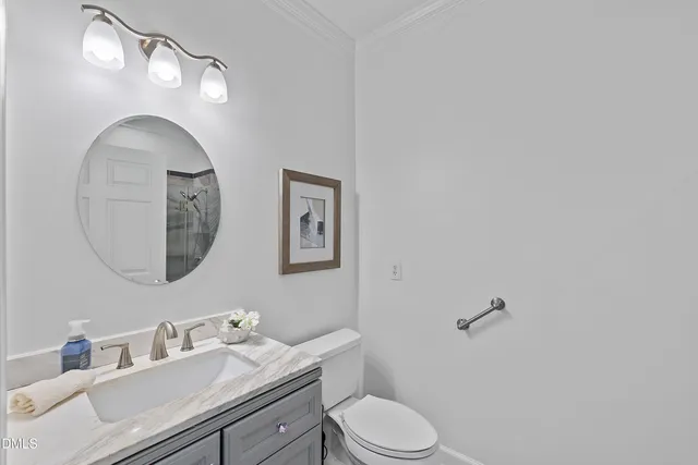 a view of living room with furniture and a window