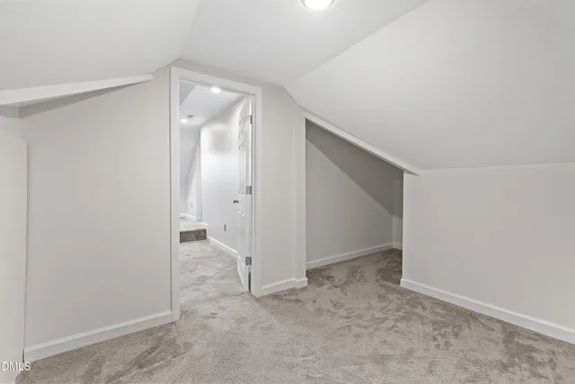 a view of a porch with wooden floor