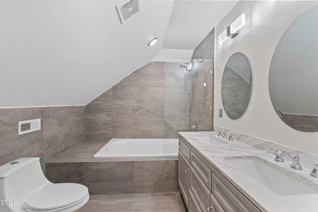 a view of a backyard with large trees