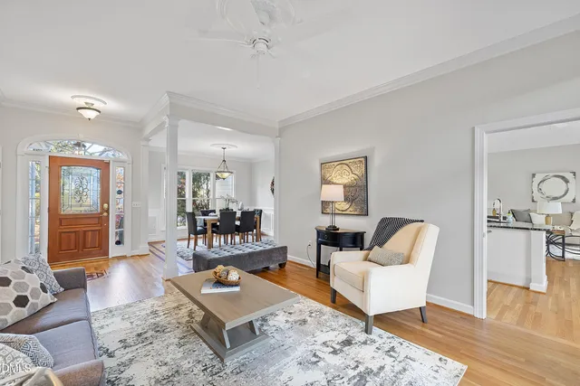 a kitchen with stainless steel appliances white cabinets and a stove