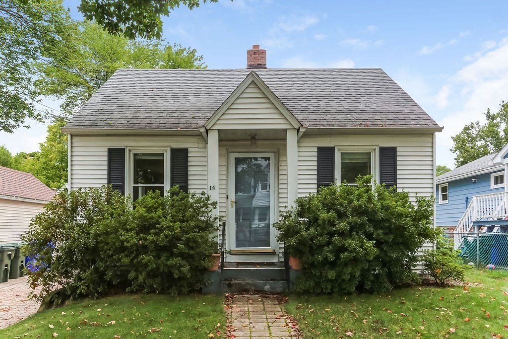 14 Bentley Street Springfield, MA 01108 - Photo 1 of 12 a view of house with garden and tall tree
