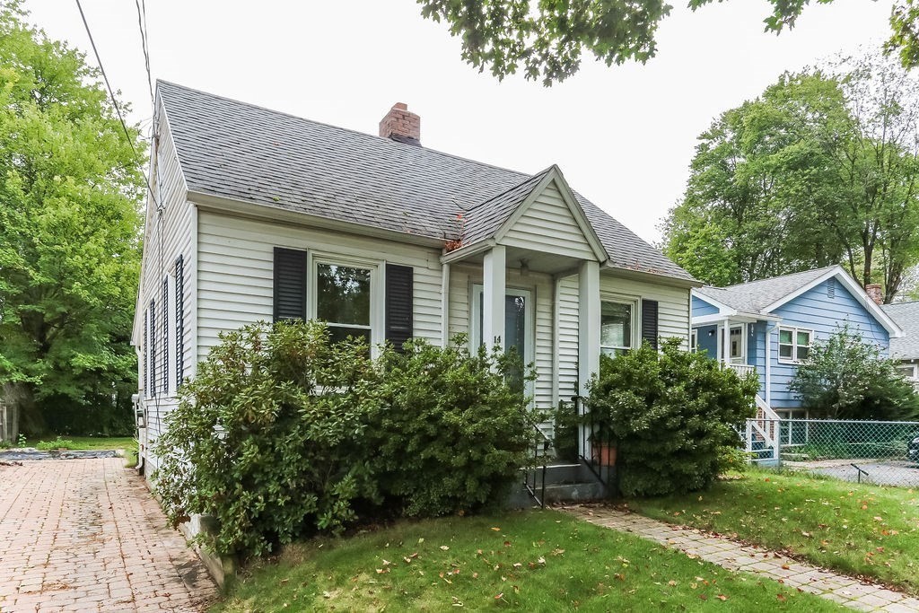 14 Bentley Street Springfield, MA 01108 - Photo 2 of 12 a front view of a house with garden