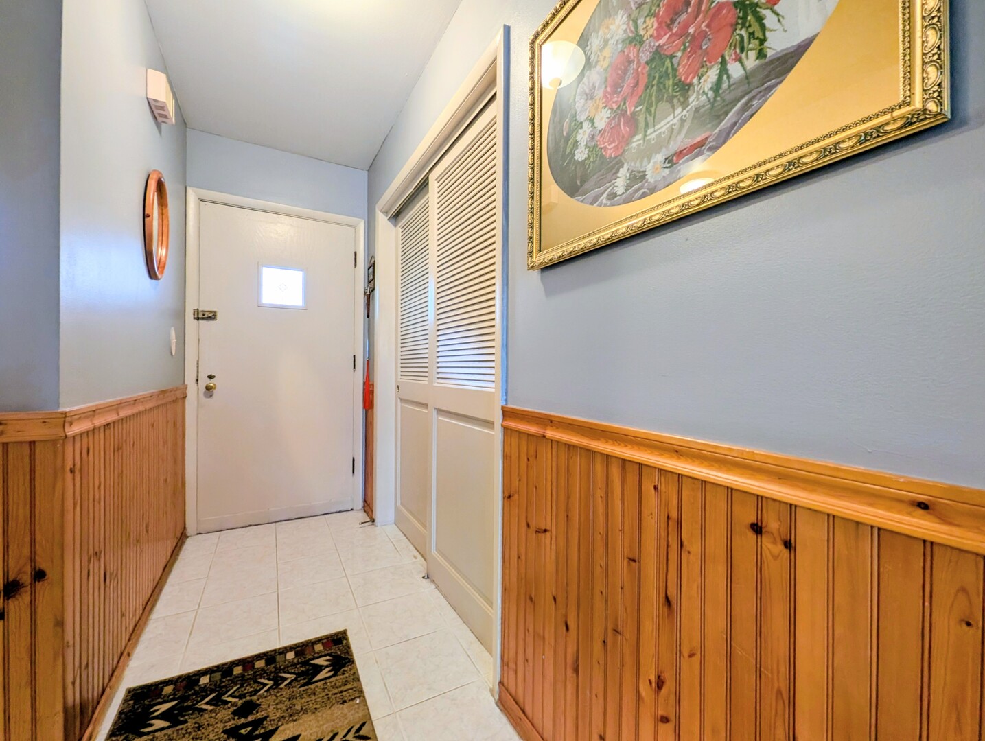 4229 North Keystone Avenue, Unit 3H Chicago, IL 60641 - Photo 8 of 22 a view of a door and wooden floor