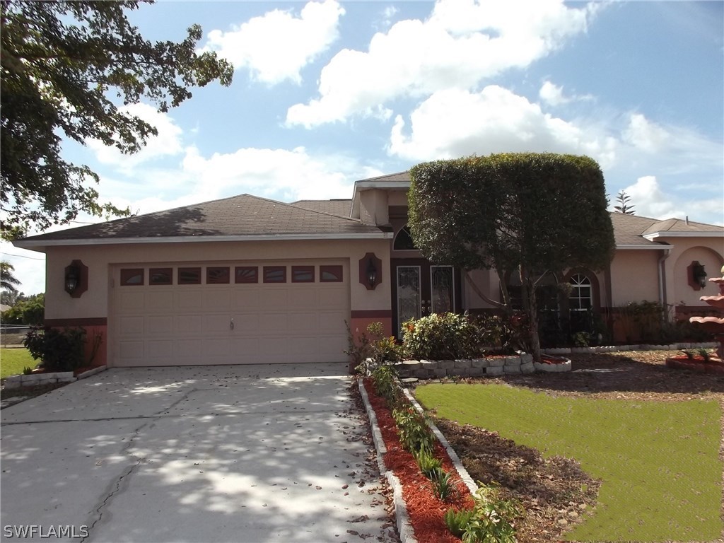 844 Rue Labeau Circle Fort Myers, FL 33913 - Photo 1 of 15 a view of a house with a yard