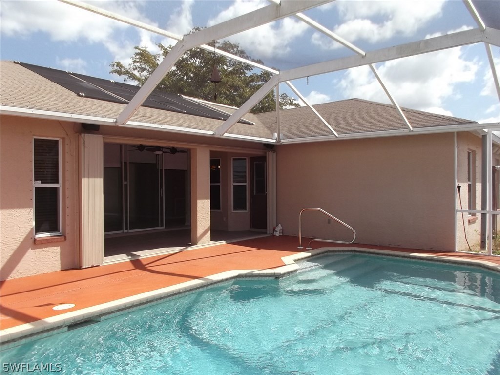 844 Rue Labeau Circle Fort Myers, FL 33913 - Photo 14 of 15 a backyard of a house with seating space