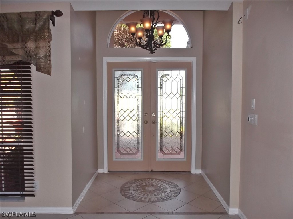 844 Rue Labeau Circle Fort Myers, FL 33913 - Photo 3 of 15 a view of an entryway with a livingroom