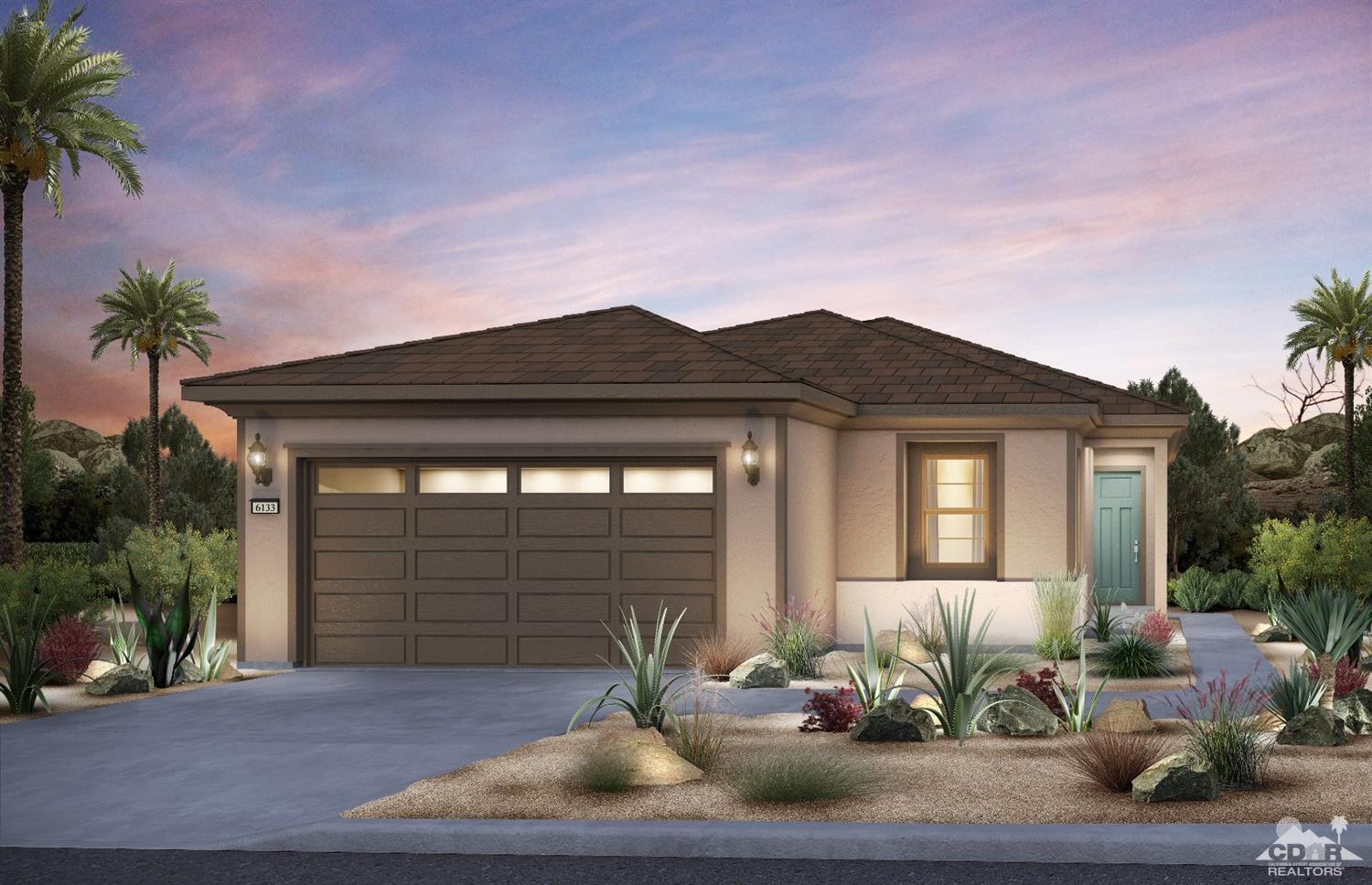 38 Syrah Rancho Mirage, CA 92270 - Photo 1 of 2 a backyard of a house with table and chairs