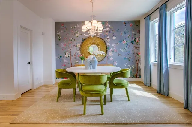 a bathroom with a sink a vanity and a window