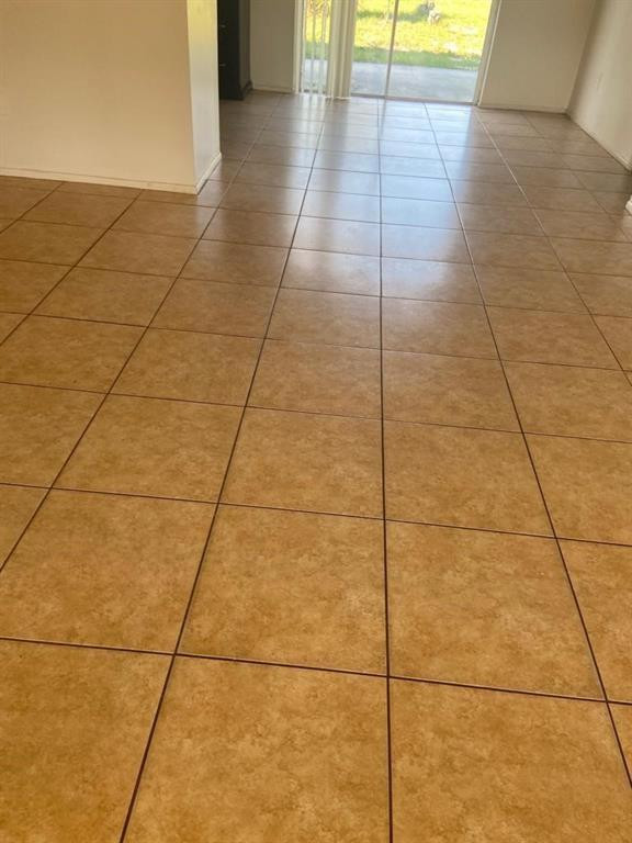 939 Burn Drive Northeast Palm Bay, FL 32905 - Photo 11 of 15 a view of a room with wooden floor