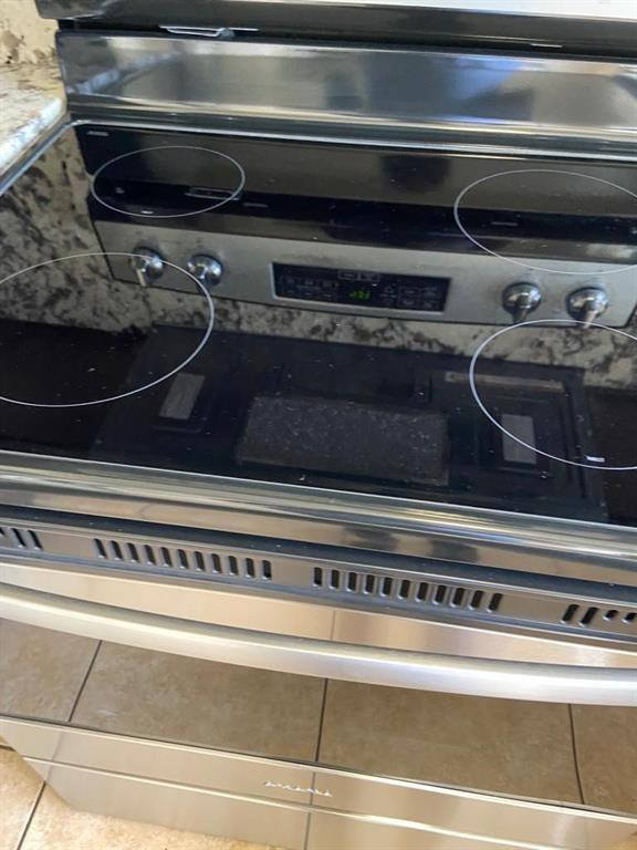 939 Burn Drive Northeast Palm Bay, FL 32905 - Photo 6 of 15 a close view of stove top oven