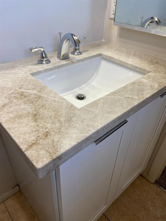 939 Burn Drive Northeast Palm Bay, FL 32905 - Photo 7 of 15 a close view of sink and tap