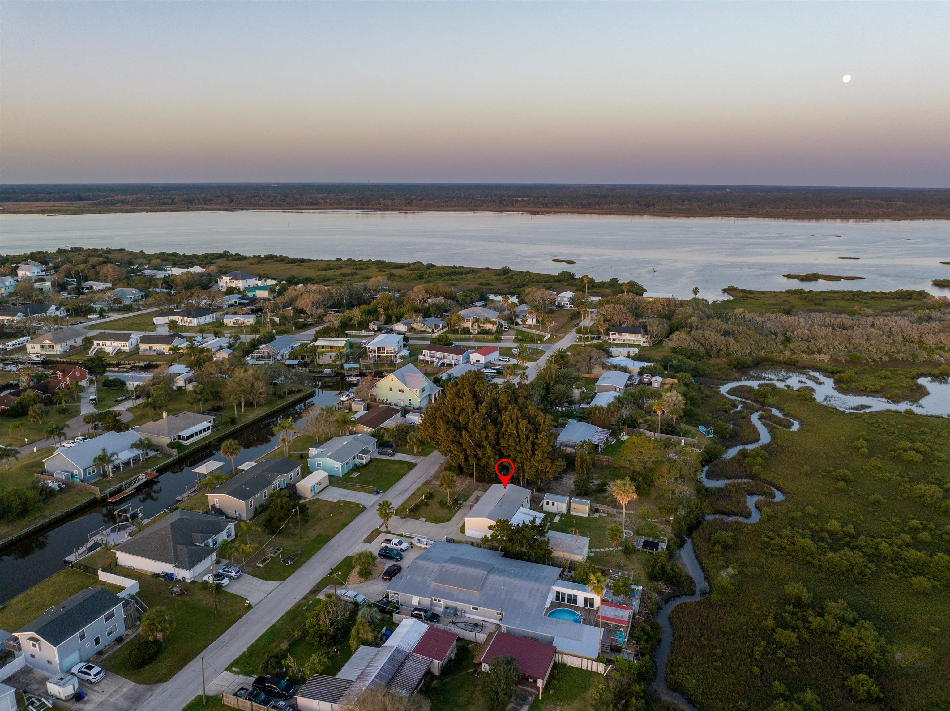 Aerial view at dusk with a water view