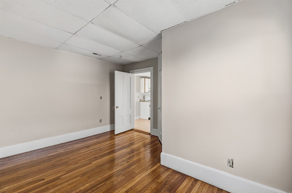 28 Prospect Street Brockton, MA 02301 - Photo 17 of 22 a view of room with wooden floor
