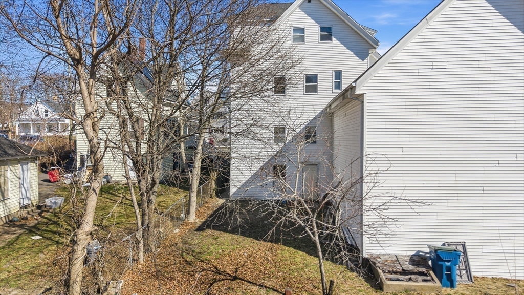 28 Prospect Street Brockton, MA 02301 - Photo 5 of 22 a view of a house with a tree