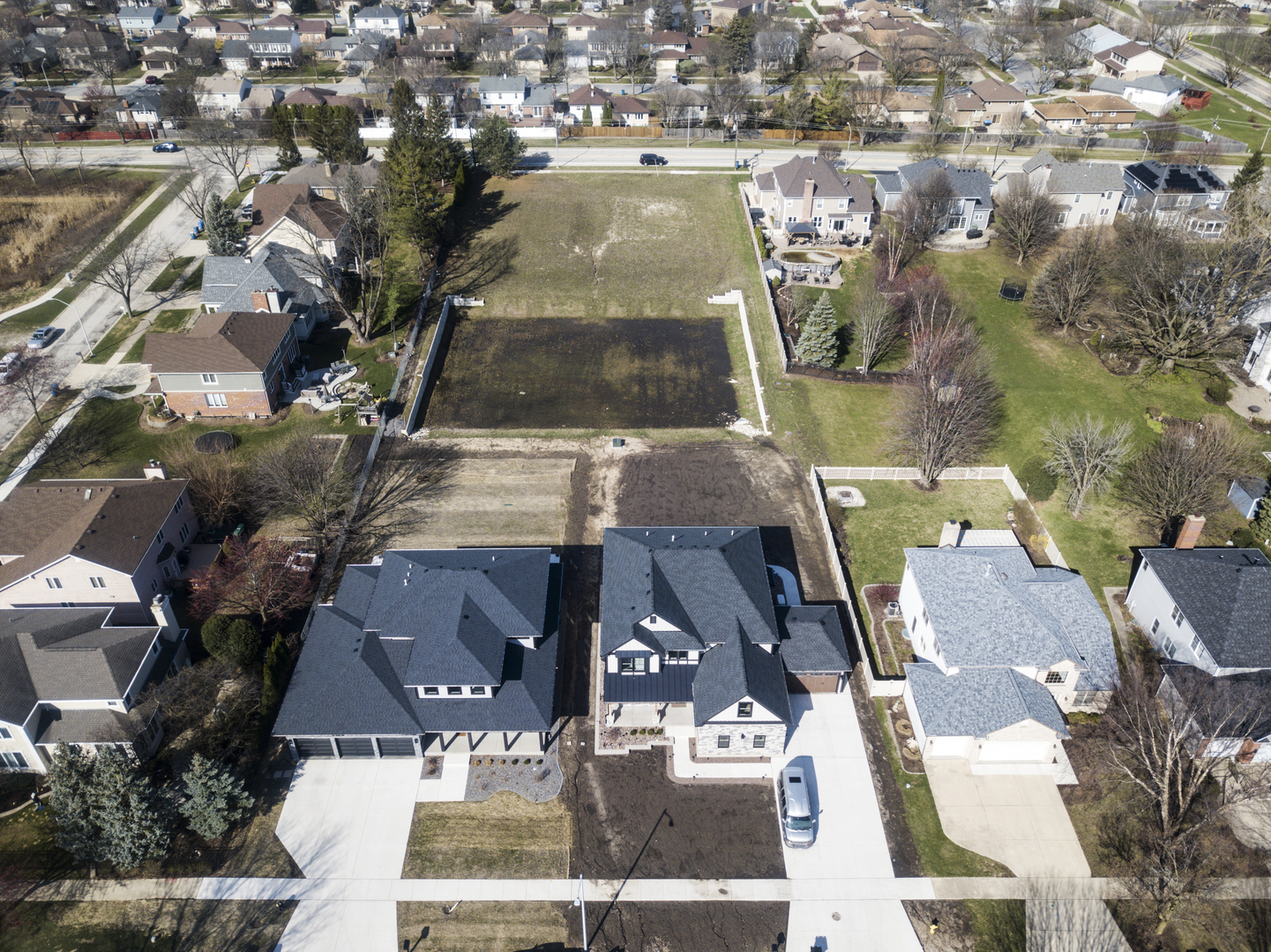 7123 Dunham Road Downers Grove, IL 60516 - Photo 3 of 4 an aerial view of a house with a yard
