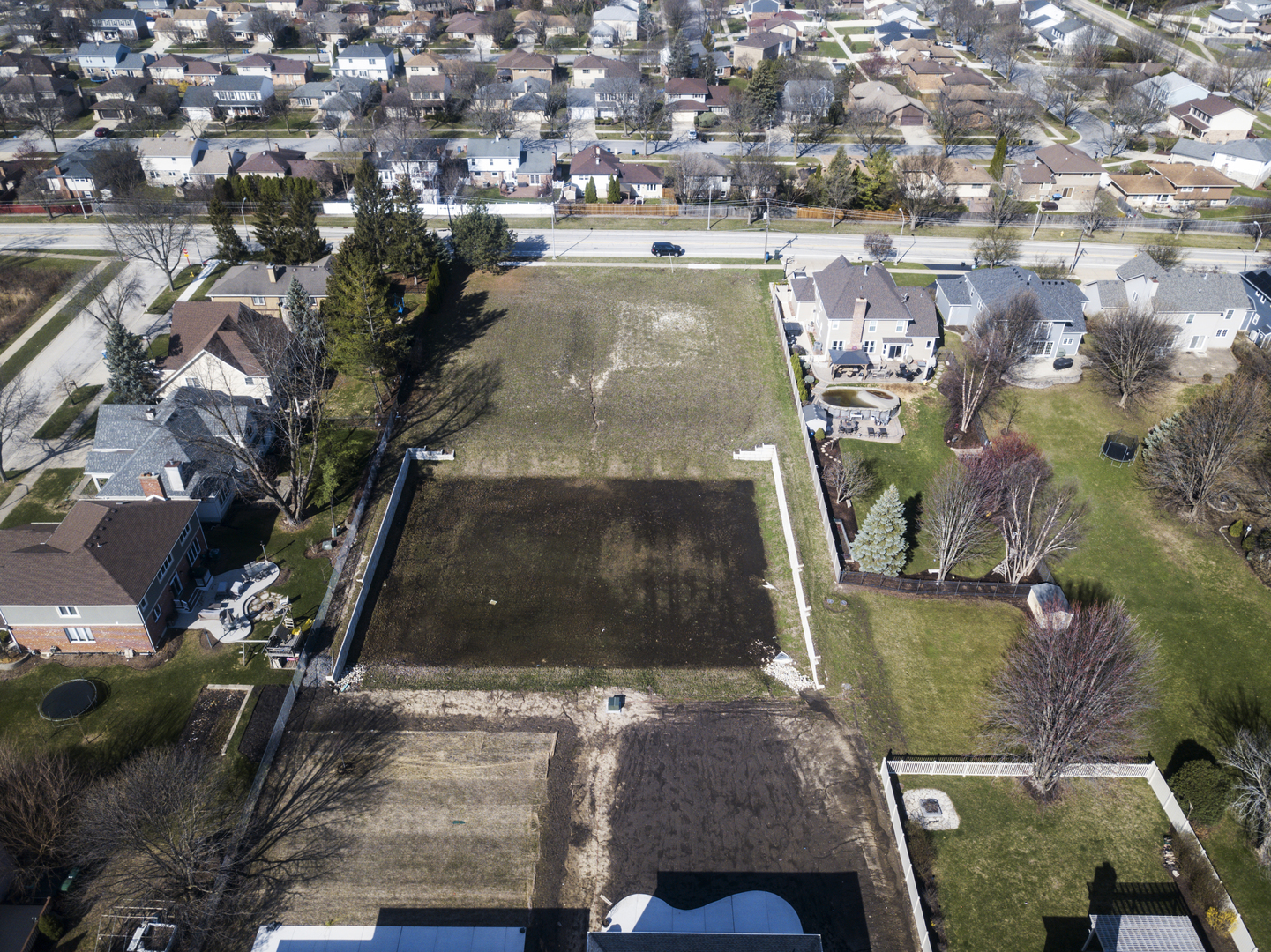 7123 Dunham Road Downers Grove, IL 60516 - Photo 4 of 4 an aerial view of residential houses with outdoor space