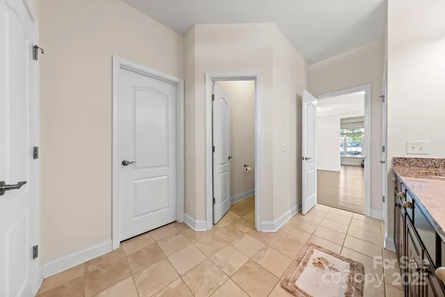 an empty room with wooden floor